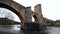Ancient medieval bridge on a rainy day in Frias, Burgos, Spain.