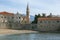 Ancient Mediterranean architecture. View of the Old Town of Budva. Bell tower of Church of St. John. Montenegro