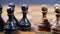 Ancient, old chess pawns pieces on wooden chessboard. Board strategy game. Focus on shabby black and white figures