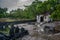 Ancient old creepy graveyard with crypt and graves at the tropical local island Fenfushi