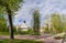 Ancient orthodox christian stone temple. Pskov, Pskov. The Church of St. Basil the Great on the Hill on a background of green