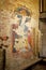 Ancient painting of jesus on the cross at the San Colombano Church, Bologna Italy