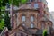 Ancient Panagia Chalkeon church, XI century, on a background of modern buildings, Thessaloniki, Greece