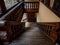 Ancient patio with wooden staircase in old timber-framing rich house XV century