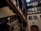 Ancient patio with wooden staircase in old timber-framing rich house XV century