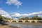 The ancient Ponte Buriano over the Arno river in the province of Arezzo, Tuscany, Italy, on a sunny day