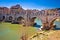 Ancient Ponte Sant Angelo stone bridge on Tiber river of Rome