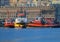 Ancient port of Genoa:tugboats moored ready to leave