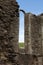 Ancient priory ruined arch in Brecon Beacons South Wales, UK