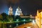 Ancient Pskov Kremlin on river bank, Trinity church, night time