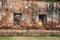 Ancient Reclining buddha through windows at Ayutthaya