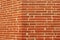 Ancient red brick wall in Haute-Garonne, near Toulouse, France.