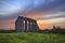 Ancient Roman aqueduct at sunset