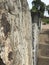 Ancient Roman Stone Tablet with Greek Writing exhibit outside