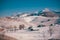 Ancient romanian houses on the frozen hills in the middle of winter