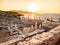 Ancient ruins at Aliki marble quarry in sunrise light, Thassos, Greece. Lens flare visible