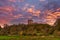 Ancient Ruins of Dundonald Castle Scotland and a Blazing Red Sunset Sky