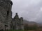 Ancient ruins of the Kilchurn Castle in a gloomy weather