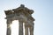 Ancient Ruins of Pergamon Acropolis. Ancient city column ruins with the sun in the background. Close-up.