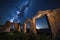 ancient ruins, with view of the night sky and stars, showing the passage of time