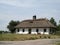 Ancient rustic shack on a field