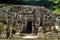 Ancient sculpture carving gate entrance tunnel of Goa Gajah or Elephant Cave significant Hindu archaeological site for travelers