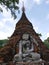 Ancient seated Buddha, red brick stupa, Myanmar