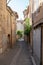 Ancient small alley in the old town of Lourmarin Vaucluse Provence France