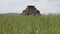 An ancient small pyramid shaped worship idol dedicated to Lord Shiva prayer place made of stones in the middle of a meadow with