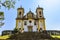 Ancient stairs and historic church of 18th century colonial architecture on top of the hill