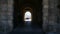 Ancient stone arched entrance to Cascais Citadel with courtyard at end, sequence