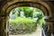 Ancient stone,arched entrance to Saint Winwaloe`s Church,Cornwall,Gunwalloe,southwest England,UK