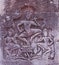 Ancient stone bas-relief on the wall of an abandoned Khmer temple. Stone sculpture of three dancing women