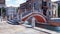 Ancient stone bridge over canal in Venice, Italy