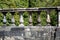 Ancient Stone Bridge Parapet Closeup in Summer