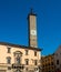 Ancient stone clock tower in the public square in the old town of Viterbo, Italy