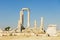 Ancient stone columns at the Citadel of Amman with the blue sky at the background in Amman, Jordan.