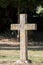 Ancient stone cross graveyard headstone. Religious monument gravestone in cemetery