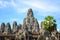 Ancient stone faces of Bayon temple, Angkor, Siem Reap, Cambodia. September 1, 2015