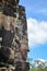 Ancient stone faces of Bayon temple, Angkor, Siem Reap, Cambodia. September 1, 2015