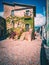 Ancient stone house decorated with ivy, historic center of the town of Castel San Vincenzo, Molise