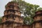 Ancient stone ruin of Kravan temple, Angkor Wat, Cambodia. Ancient temple tower in forest.