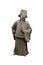 Ancient stone sculpture of Chinese political nobleman isolated on white background.