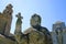 Ancient stone statue and aisled church, Spain