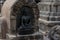 Ancient stone statue of buddha in the holy temple