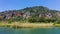 Ancient stone tomb of ancient Greek town Myra town on the Dalyan River. Lycian tombs. Shooting from the boat to the