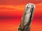 Ancient stone totem sea sunset