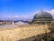 Ancient stone wall and domes of Suleymaniye Madrasa on the background of the sea landscape of Istanbul Turkey. Beautiful urban