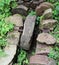 Ancient stone wheel of abandoned water mill to grind flour