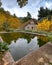 Ancient stoned christian orthodox church and bond in autumn. Kourdali chapel Troodos Cyprus